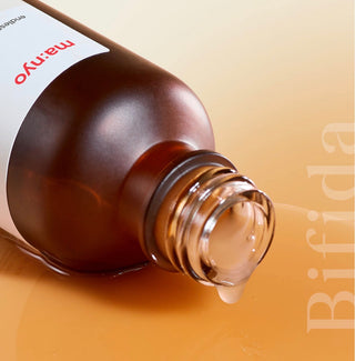 Ma:nyo Bifida Biome Complex Ampoule bottle showing the clear liquid and minimalist packaging design for skincare use.