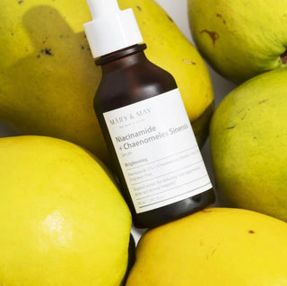 Mary&May Niacinamide and Chaenomeles Sinensis Serum bottle showing the product label and packaging.