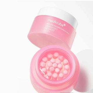 Medicube PDRN Pink Collagen Capsule Cream in 55g jar, showing the pink cream and capsule design for youthful skin.