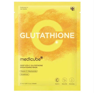 Medicube Deep Vita C Glutathione brightening face sheet mask spread open on a clean surface, showing the mask's texture and packaging.