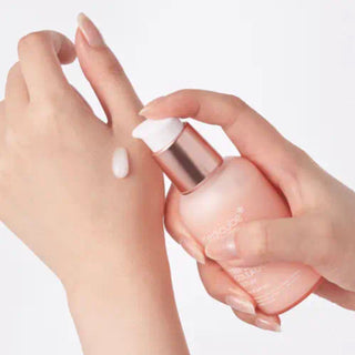 Medicube Triple Collagen Serum 4.0 in 55mL bottle, featuring clear serum with a sleek packaging design and dropper applicator.