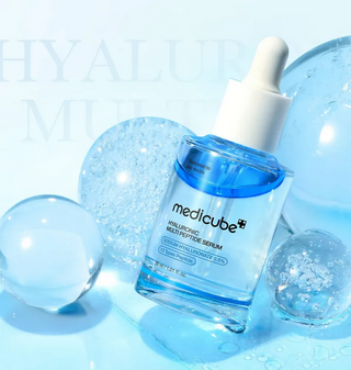 Medicube Hyaluronic Multi Peptide Serum in 30mL bottle, featuring clear liquid with a dropper for facial hydration and skin rejuvenation.