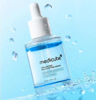 Medicube Hyaluronic Multi Peptide Serum 30mL bottle showing clear liquid and pump dispenser for skincare hydration and anti-aging.