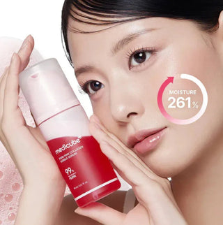 Medicube PDRN Pink Collagen Bubble Serum in a 95mL bottle, showcasing a pink, bubbly serum with a sleek pump dispenser.