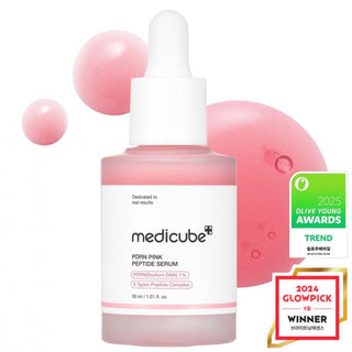 Medicube PDRN Pink Peptide Serum bottle, 30mL, with a sleek pink design and pump dispenser for skincare.