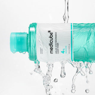 Medicube Azelaic Acid Niacinamide Clear Toner in a 250mL bottle, featuring a clear liquid and minimalist packaging design.