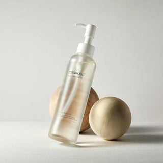 Mixsoon Bean Cleansing Oil bottle showing clear liquid and label, designed for gentle facial cleansing.