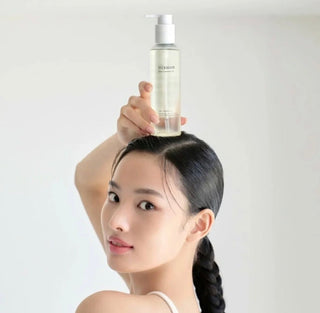 Bottle of Mixsoon Bean Cleansing Oil with pump dispenser, showing the product label and clear liquid inside.