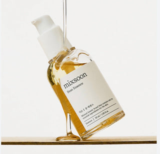 Mixsoon Bean Essence in a 30ml bottle, featuring clear liquid and minimalist label design, ideal for skincare routines.