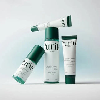 Purito Seoul Wonder Releaf Centella Serum in 60mL bottle, featuring clear liquid and dropper applicator for soothing skin care.