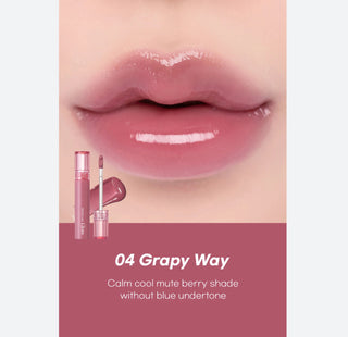 Rom&nd Glasting Colour Gloss lip gloss in a soft purple shade, showcasing a shiny, smooth finish on lips.