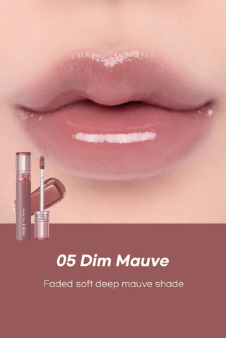 Rom&nd Glasting Colour Gloss in mauve, featuring a shiny, smooth lip gloss applicator and glossy finish.