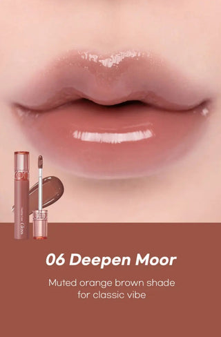 Rom&nd Glasting Colour Gloss lip gloss in shade 06 Peedpen Moor with shiny, smooth finish and clear packaging.