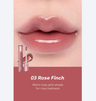 Rom&nd Glasting Colour Gloss lip gloss in shade Rose Finch, featuring a shiny, smooth finish and natural pink hue.