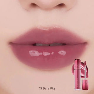 Rom&nd The Juicy Lasting Tint lip tint in a 3.5g tube with vibrant pink color and sleek packaging.