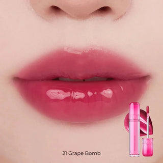 rom&nd The Juicy Lasting Tint lip tint in 3.5g, showing the vibrant pink shade in a sleek tube with applicator.