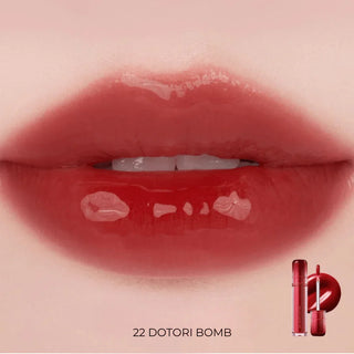 ROM&ND The Juicy Lasting Tint lip tint in shade 22, showing the 3.5g tube with vibrant lip color and product branding.