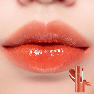 Rom&nd The Juicy Lasting Tint lip tint in apple brown shade, showcasing smooth, vibrant color on lips.