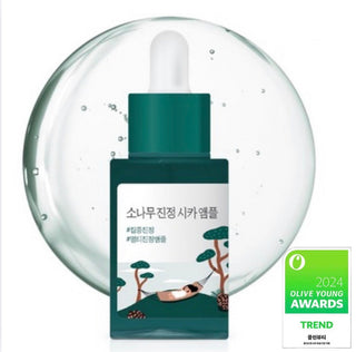 Face sheet mask featuring ROUND LAB Pine Calming Cica Ampoule, designed to soothe and hydrate skin with calming pine extracts.