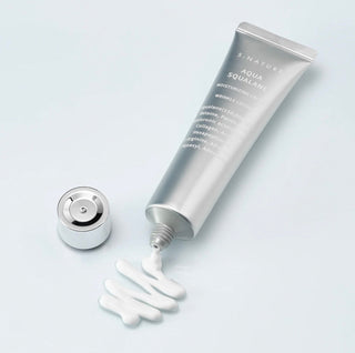 S.NATURE Aqua Squalane Moisturizing Cream jar with smooth, light-textured cream in a 60ml container.