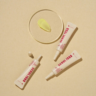 KSECRET Seoul 1988 Advanced Shot retinal liposome serum with black rice for anti-aging skincare, shown in a sleek bottle.