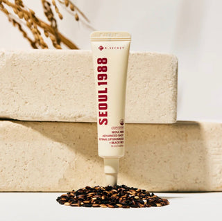 KSECRET Seoul 1988 Advanced Shot retinal liposome and black rice anti-aging serum in a sleek bottle, designed for youthful skin.