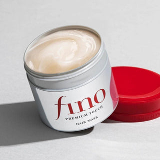 Shiseido Fino Premium Touch serum hair mask in 230mL jar, nourishing hair care treatment with a smooth, silky finish.