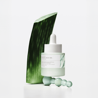 SKIN1004 Madagascar Centella Azelaic Acid 10% Ampoule 30ml, clear bottle with dropper for soothing skincare treatment.