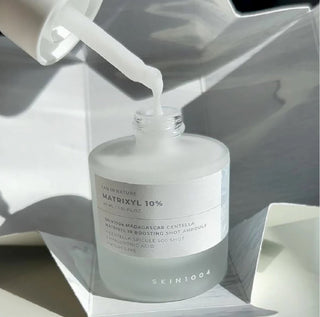 SKIN1004 Madagascar Centella Matrixyl 10% Boosting Shot Ampoule 30ml bottle with dropper for skin serum application