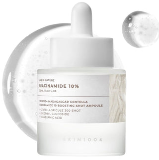 Skin1004 Madagascar Centella Niacinamide 10% Boosting Shot Ampoule in a clear 30ml bottle, with a dropper cap and label.