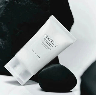 Skin1004 Madagascar Centella Tone Brightening Capsule Cream moisturizer in a jar, featuring a smooth, brightening skincare product.