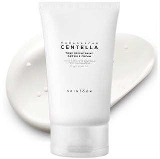 Skin1004 Madagascar Centella Tone Brightening Capsule Cream moisturizer in a jar, showcasing its smooth, brightening skincare formula.
