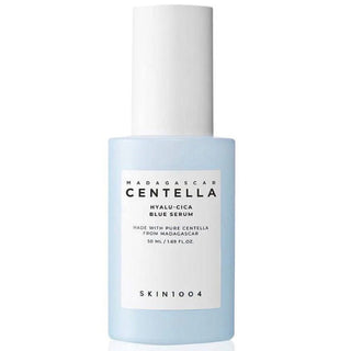 Skin1004 Madagascar Centella Hyalu-Cica Blue Serum in a 30ml bottle, brightening serum for dry skin with soothing ingredients.