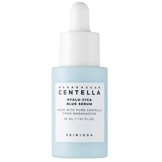 Skin1004 Madagascar Centella Hyalu-Cica Blue Serum in a 30ml bottle, designed for skin brightening and hydrating dry skin.
