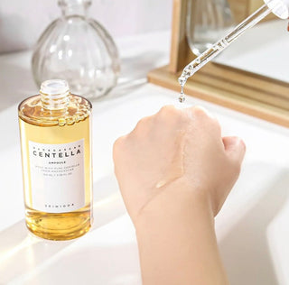 Skin1004 Madagascar Centella Ampoule in a 30ml serum bottle, featuring natural ingredients for skin soothing and hydration.