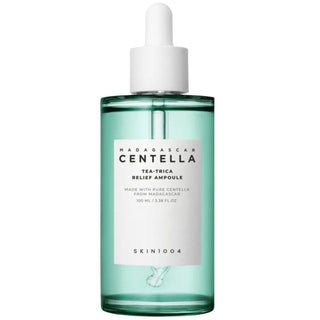 Skin1004 Madagascar Centella Tea-Trica Relief Ampoule serum in a 30ml bottle, showcasing clear glass container with product label.