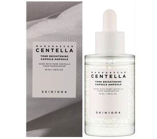 Skin1004 Madagascar Centella serum in a 30ml bottle, featuring brightening capsule ampoule for even skin tone and rejuvenation.