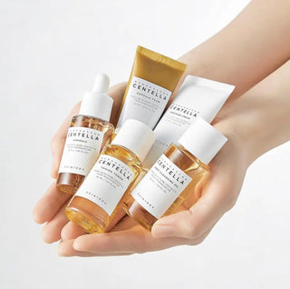 SKIN1004 Madagascar Centella travel skincare set with 150mL bottle, includes gentle skincare products in a compact box.