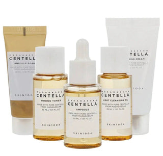 SKIN1004 Madagascar Centella travel skincare set with 150ml bottles, includes cleanser, toner, and moisturizer in a compact box.