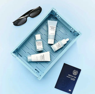 SKIN1004 Madagascar Centella Hyalu-cica travel skincare kit with 120ml bottles, featuring soothing and hydrating skincare products.
