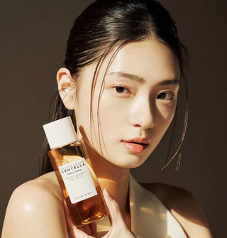 Skin1004 Madagascar Centella Toning Toner and Emulsion in 210ml bottles, featuring centella for soothing and hydrating skincare.