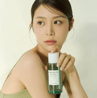 Skin1004 Madagascar Centella Tea-Trica Purifying Toner 210ml bottle, labeled with product name and brand, on a plain background.