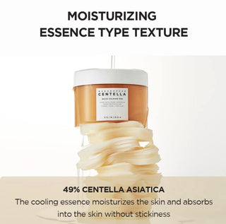 SKIN1004 Madagascar Centella Quick Calming Toner Pads with soothing ingredients, displayed in a white container with open pads.