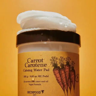SKINFOOD Carrot Carotene Calming Water Pad showing the soft, textured water pad soaked in calming solution for sensitive skin.