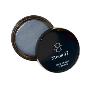 Studio 17 Brush and Puff Cleanser for makeup tools, featuring a clear bottle with a pump and cleaning solution inside.