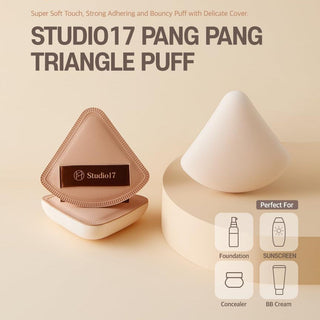 Studio 17 Pang Pang Triangle Puff makeup tool, soft applicator for blending foundation and powder, shown in close-up image.