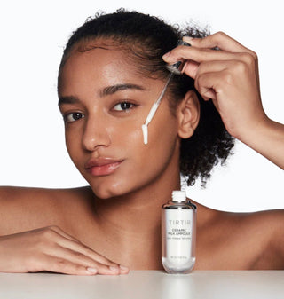 TIRTIR Ceramic Milk Ampoule 40mL in a clear glass bottle with a white cap, designed for skincare hydration and nourishment.
