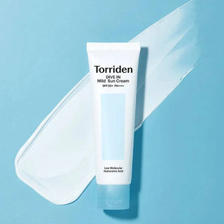 Torriden Dive-In Mild Sun Cream SPF50+ PA++++ bottle with white and blue packaging, showing the product label.